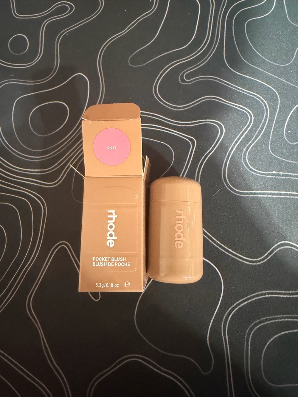 Wearable product box held in hand